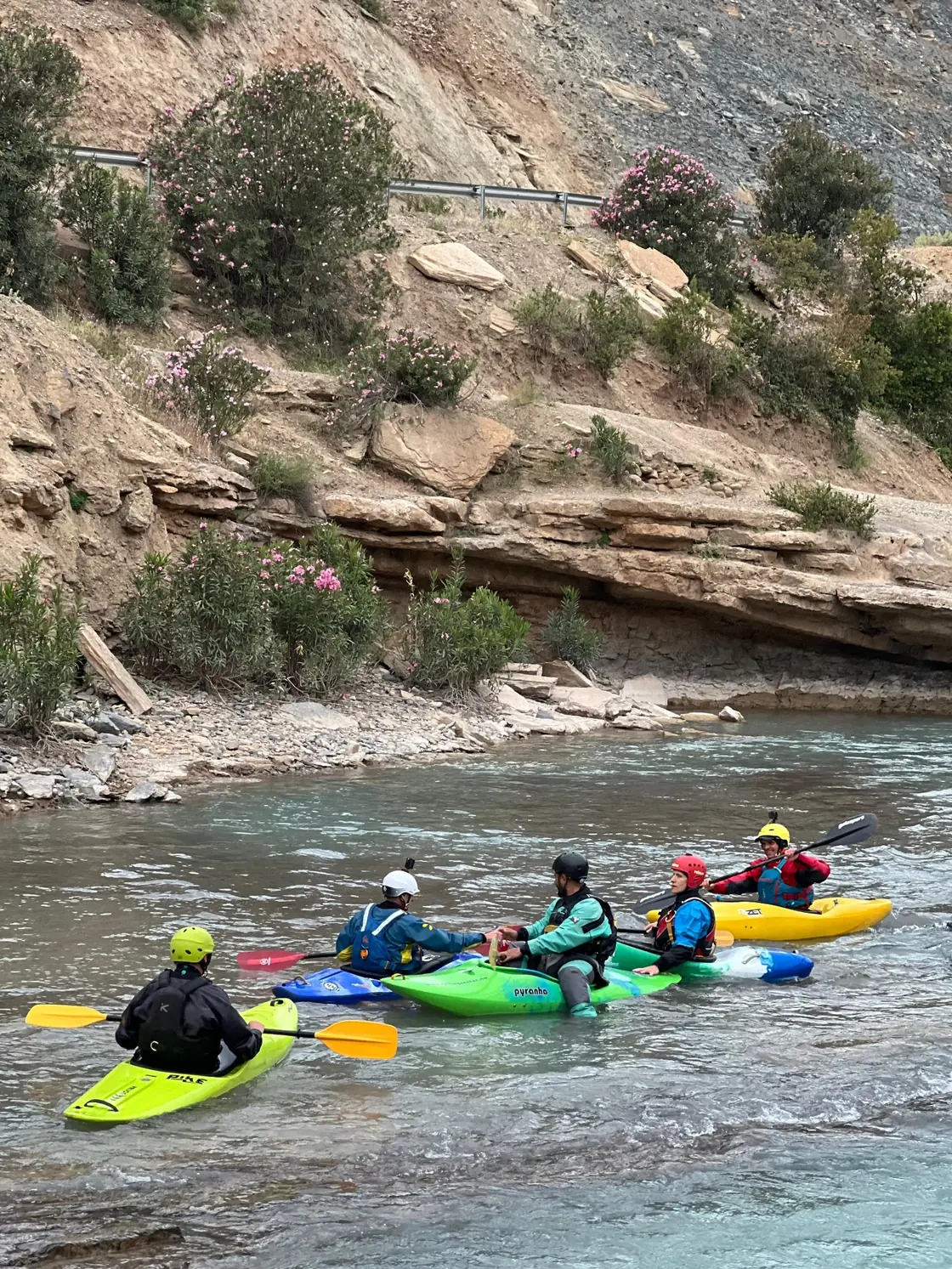 Kayak team on the river